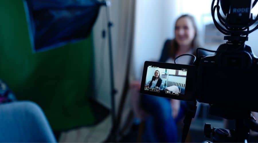 Someone sitting in front of a camera