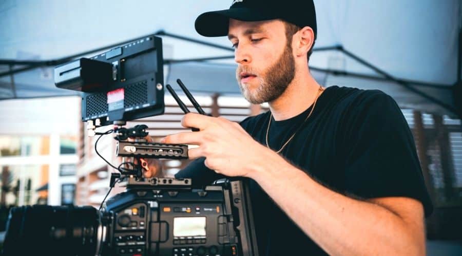 A Filmmaker dude shooting with a camera