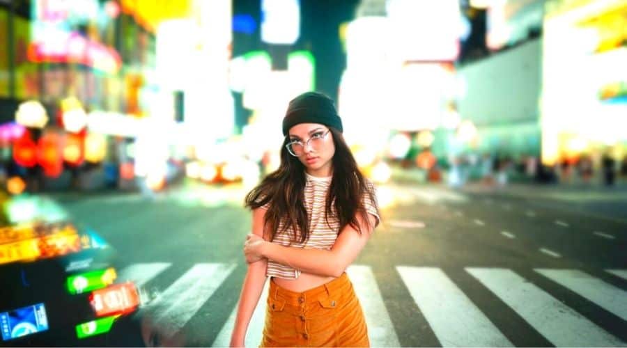 beautiful girl posing on the street - selecting Right Background for your portrait photography need