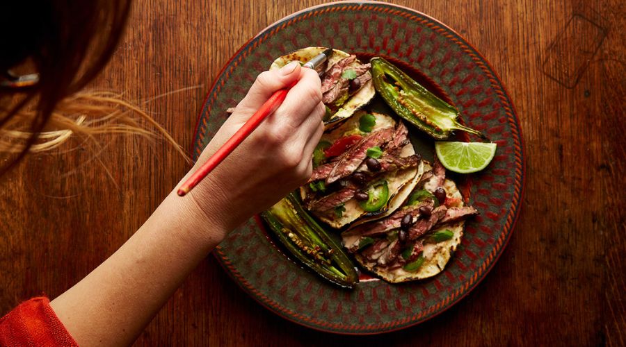 Person Styling food before taking photos